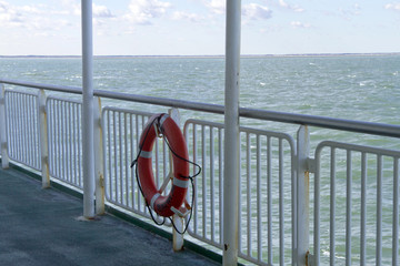 Life Preserver Hanging on a Ferry Boat Railing
