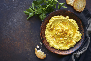 Homemade traditional lebanese chickpea hummus.Top view with copy space.