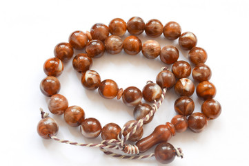 brown beads isolated on white