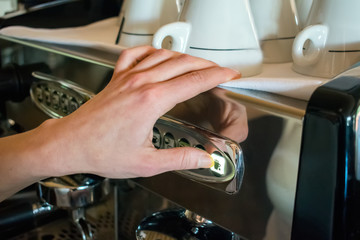Espresso machine making coffee in pub, bar, restaurant