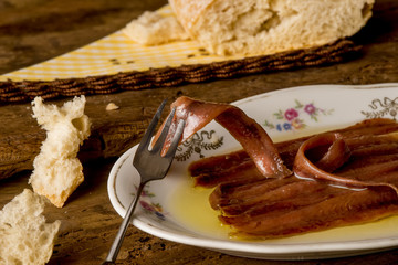 Salted anchovy fillets with olive oil