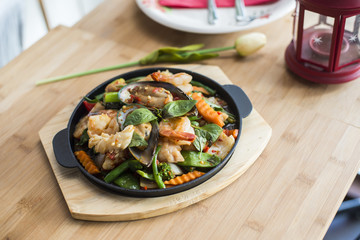 Thai basil stir fried with seafood.
