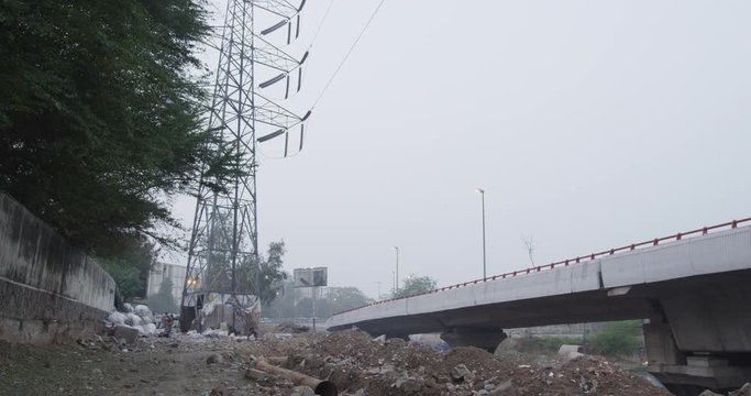 A river runs near Barapullah Elvated Road.