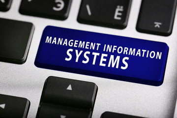 MANAGEMENT INFORMATION SYSTEMS button on keyboard, closeup © Africa Studio