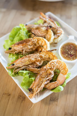 grilled king prawn with seafood sauce.