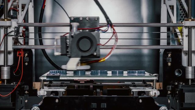 3D diy printer printing plastic mechanical parts in timelapse
