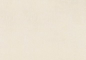 ベージュ色の日本の着物で使われる絹の布テクスチャ背景