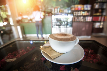 cup of coffee on table in cafe