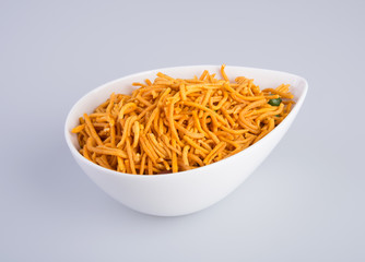 murukku or traditional indian snack chakli and chakali on background.