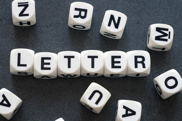 word letter on toy cubes