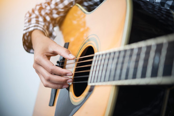 Fototapeta premium Hand play Acoustic fingerstyle guitar.