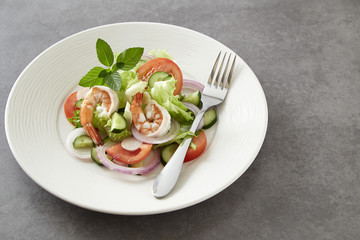 Salad of vegetables and boiled shrimp