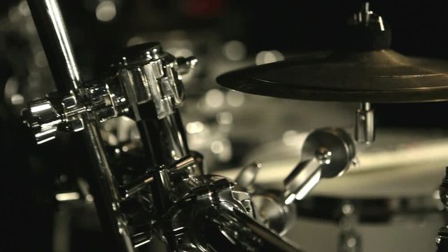 Musical drums kit on black background. Set drums. Close up of white drum set on dark background. Percussion instruments. Instruments drummer. Drum tools. Music drum plate. Musical instruments