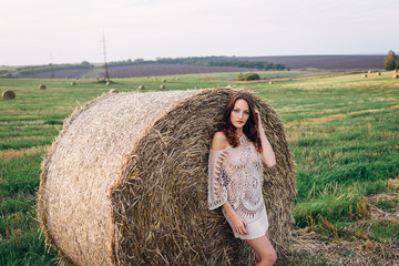  A girl in haystacks