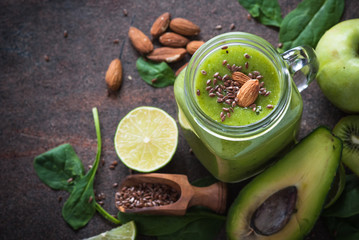 Green apple and spinach smoothie with seeds and almond. Detox drink.