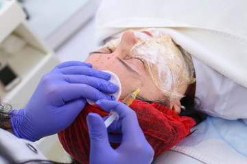 Researcher performs blood centrifuging