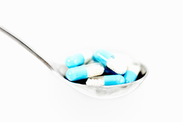 Spoonful of capsules