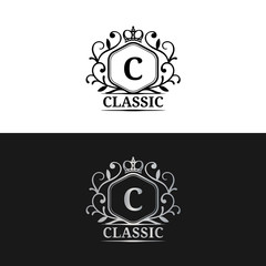 Vector monogram logo template. Luxury letter design. Graceful vintage character with crown illustration for hote etc.