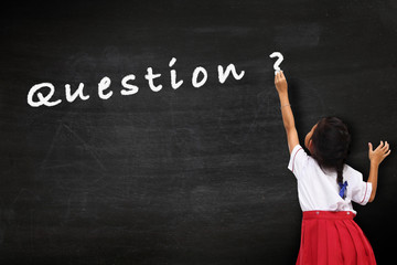 Girl drawing on blackboard