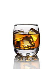 Glass of scotch whiskey with ice cube