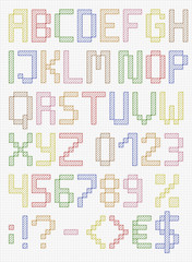 Colorful stitched uppercase english alphabet with numbers and symbols. Isolated on white cloth texture