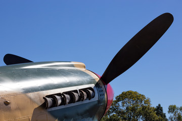 Old plane propeller with blue sky