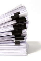 Stack of business papers isolated on white background