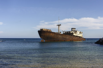 Rusted ship in industrial area on Lanzarote, Canary Islands, Spain