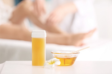 Wax depilation set on table in spa center