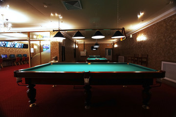 Large room with pool tables