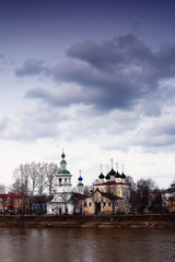 orthodox church river bank sky clouds
