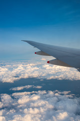 Fototapeta na wymiar View from the window plane with cloud and fuji mountain.