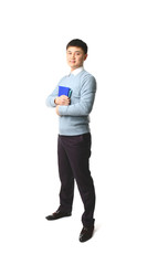 Handsome young Asian teacher on white background