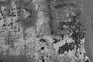 Wall fragment with scratches and cracks