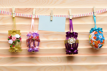 easter colorful eggs decorated with thread, beads, with paper sheet