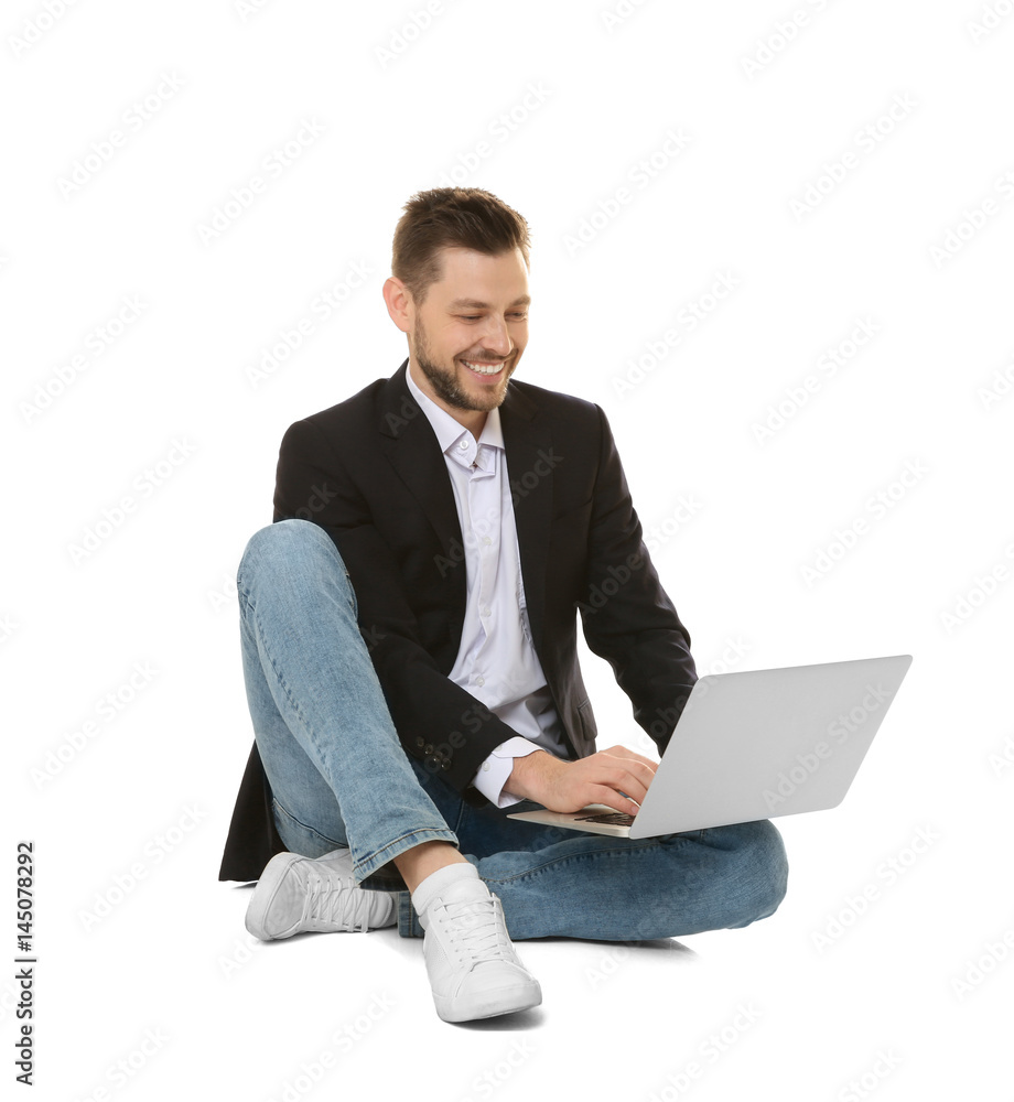 Sticker Handsome young man with laptop on white background