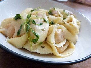 Dumplings on plate with thyme
