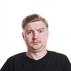 Obraz premium Feeling shocked, surprised man grimacing to camera