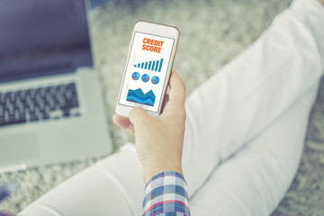 Business Charts and Graphs on screen with CREDIT SCORE title