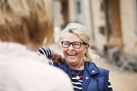 Mature woman laughing