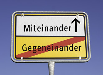 Obraz premium Miteinander/Gegeneinander Schild