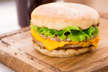 Fast food hamburger  On a wooden board