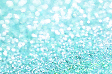 Bule bokeh texture. Festive glitter background with defocused lights