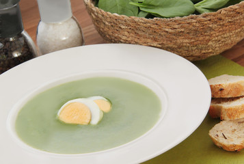 Spinach soup with bioled egg and wholemeal bread.