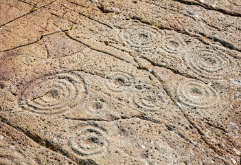 Cup and ring marks on a stone near Cairnbaan in Scotland