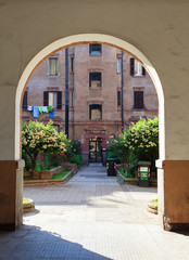 Italian courtyard. Patio with roses, Rome, Italy  
