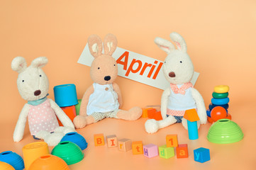 Obraz na płótnie Canvas Easter bunnies celebrating birthday in April