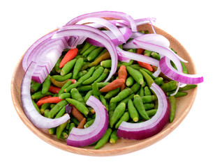 onions and Chili garden in wooden plate on white background