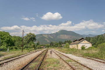 Fototapeta na wymiar Empty railway near old railway station 