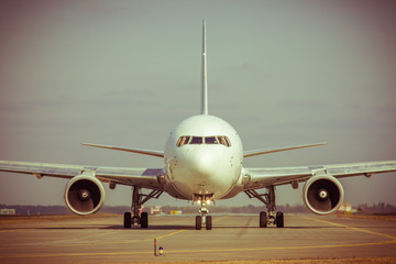 Naklejka premium Passenger plane on runway